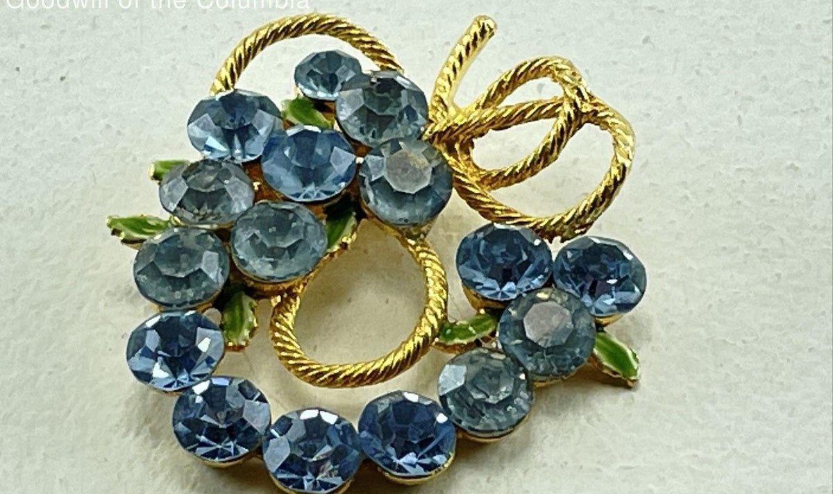 Gold-tone openwork brooch with blue rhinestone cluster and green enamel leaves, view 2
