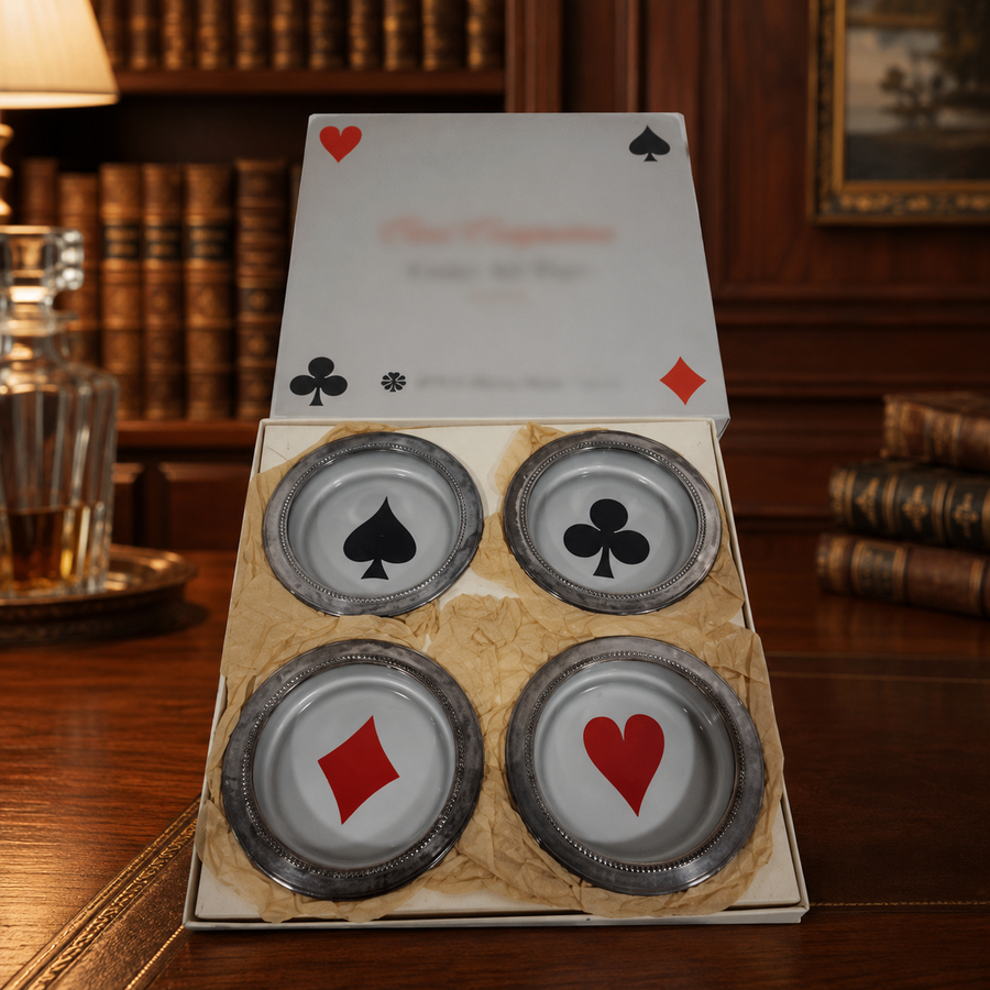 Four round silver-tone card suit coaster ash trays with spade, club, heart and diamond in fitted box