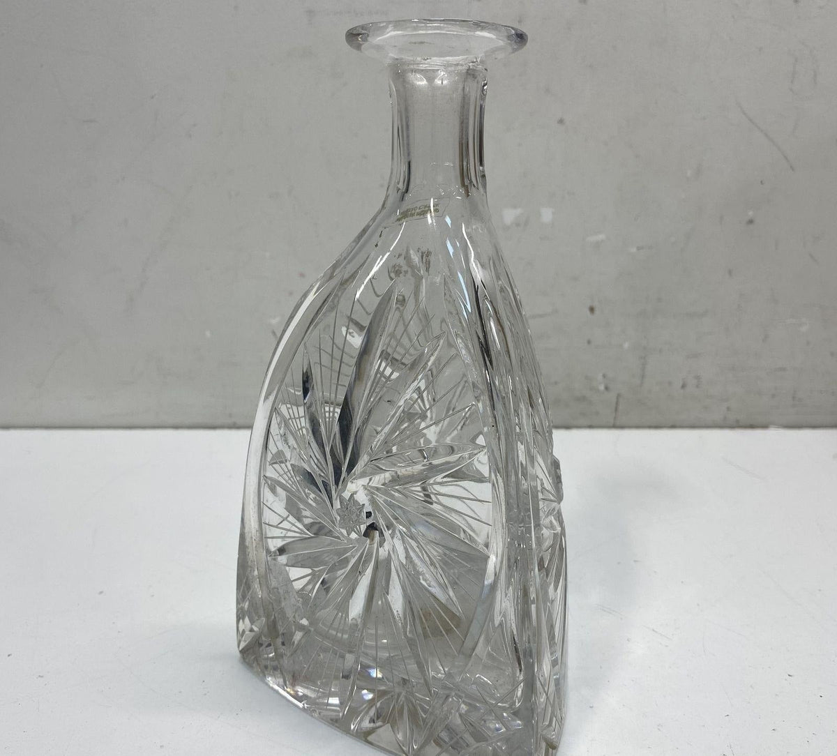 Clear cut glass decanter with deep-cut pinwheel and star pattern, view 2