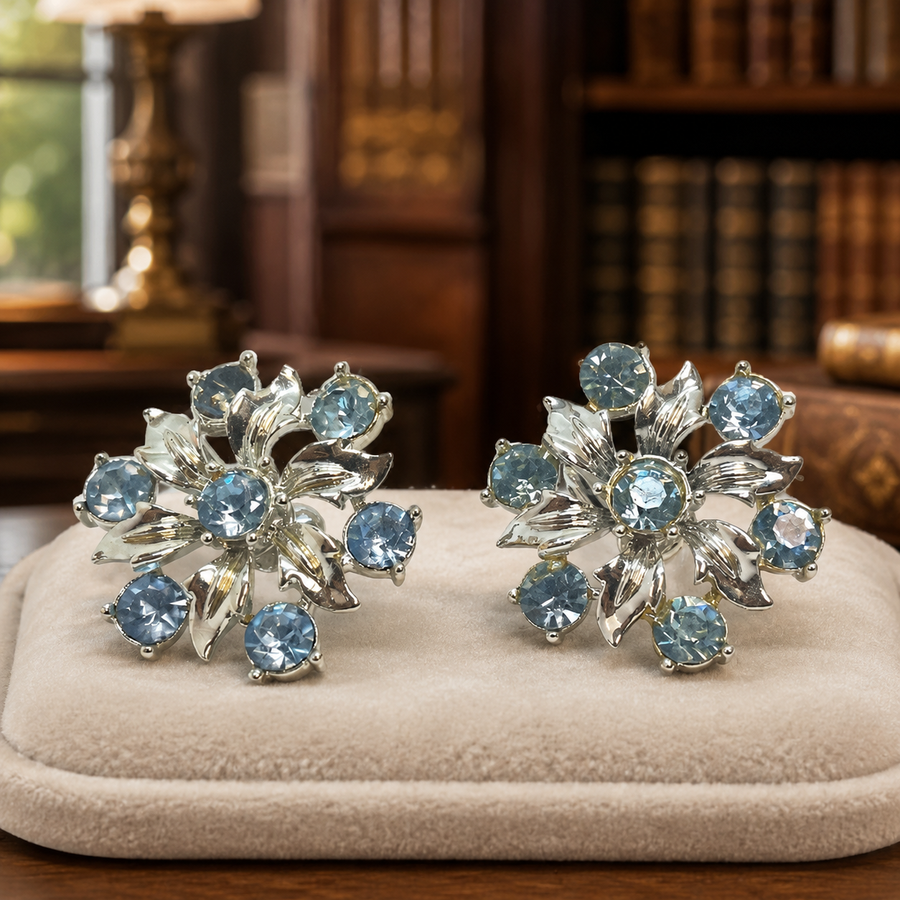 Gold-tone clip earrings with blue rhinestones