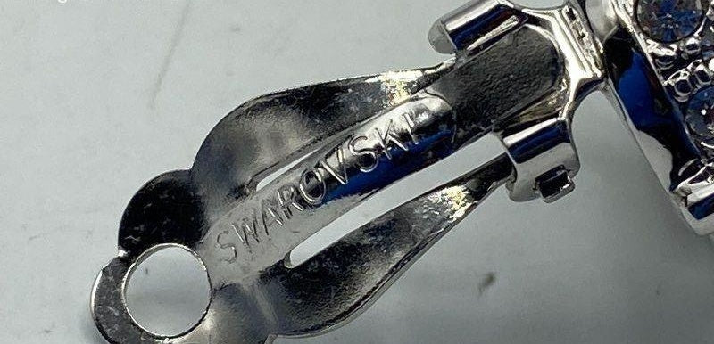 Swarovski silver-tone huggie clip earrings with pavé crystal fronts, view 2