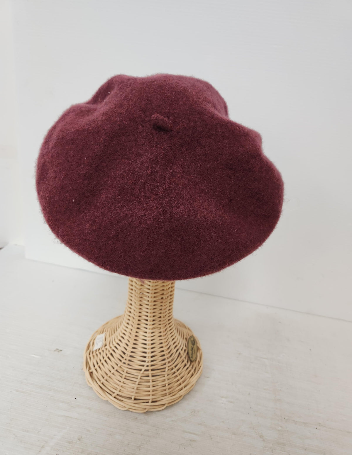 Frye burgundy beret with soft rounded crown and black lining, view 5