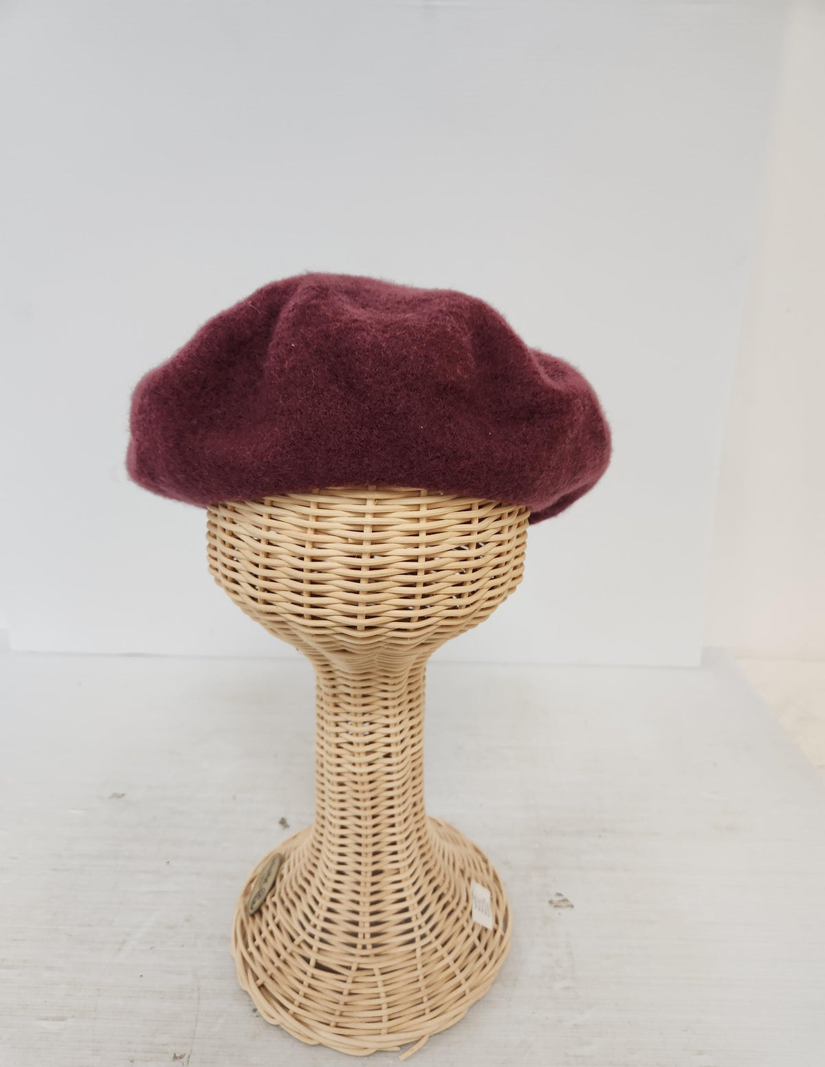 Frye burgundy beret with soft rounded crown and black lining, view 6