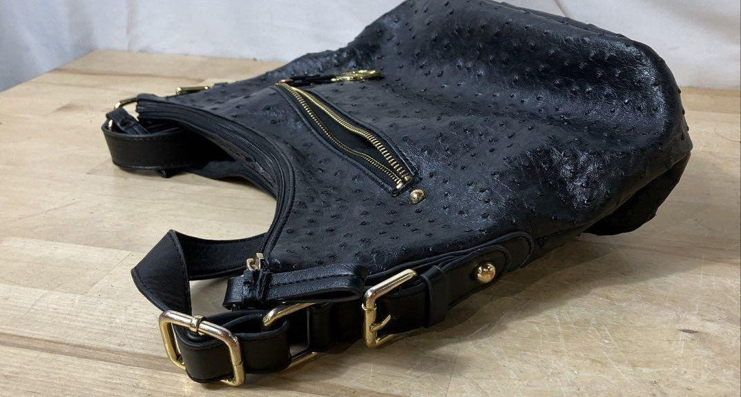 Black faux ostrich embossed hobo bag with gold-tone hardware and adjustable strap, view 6