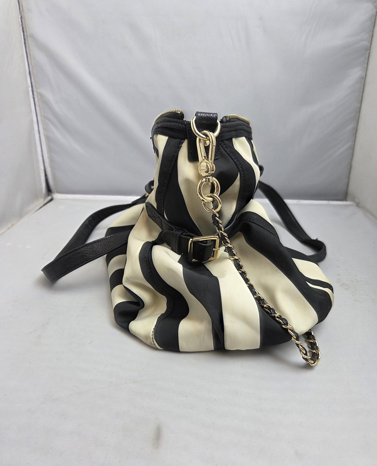 Black and white striped tote with black trim and gold-tone accents, view 7