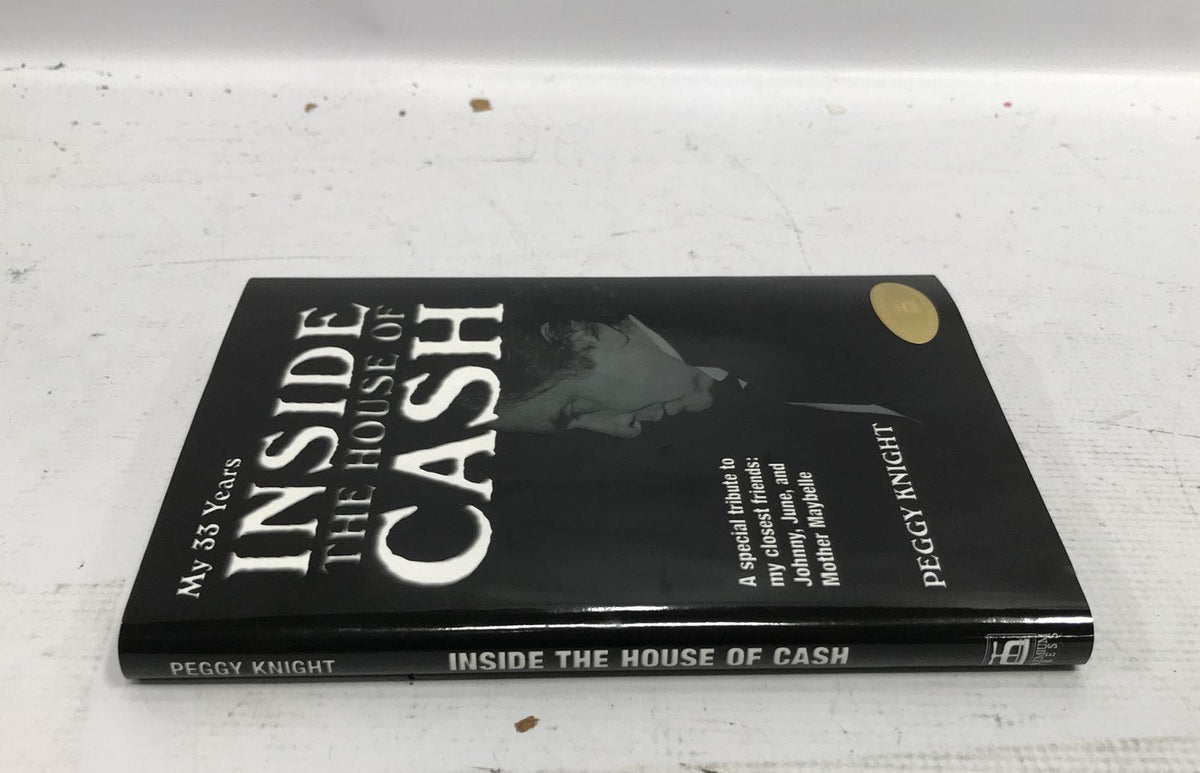 Inside the House of Cash by Peggy Knight, black cover with autographed copy sticker, view 6