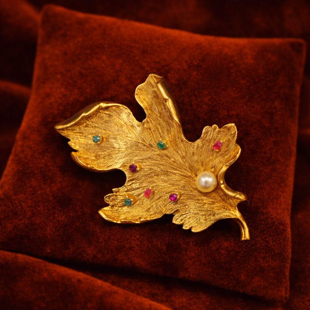 Signed Capri gold-tone leaf brooch with multicolor stones and faux pearl
