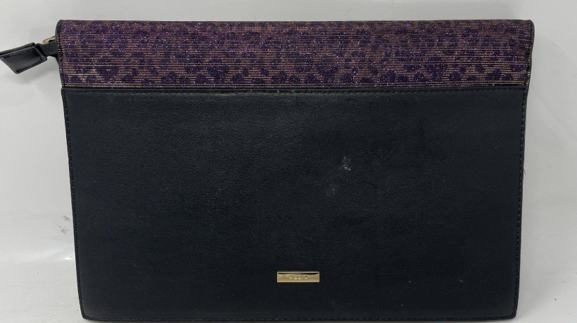 Black clutch with purple leopard print glitter flap, gold-tone frame base and shoulder strap, view 5