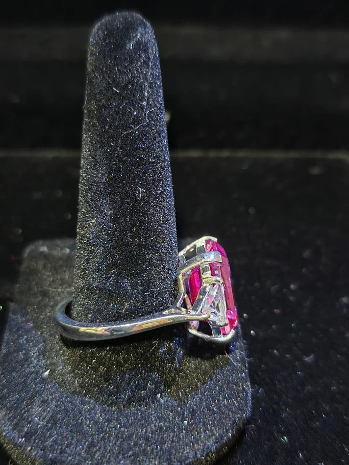 Silver-tone cocktail ring with emerald-cut red center stone and clear trillion side stones, view 3