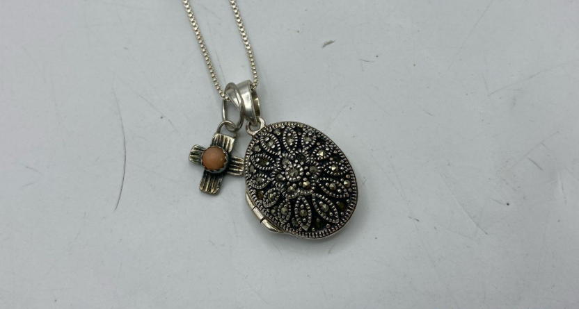 Sterling silver floral oval locket pendant marked 925 Thailand on chain, view 3