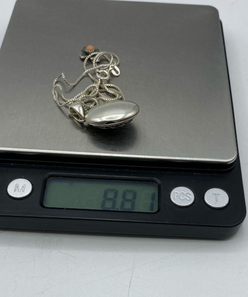 Sterling silver floral oval locket pendant marked 925 Thailand on chain, view 6