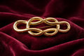 Vintage Monet Gold-Tone Interlocking Knot Brooch | Signed Designer Statement Pin