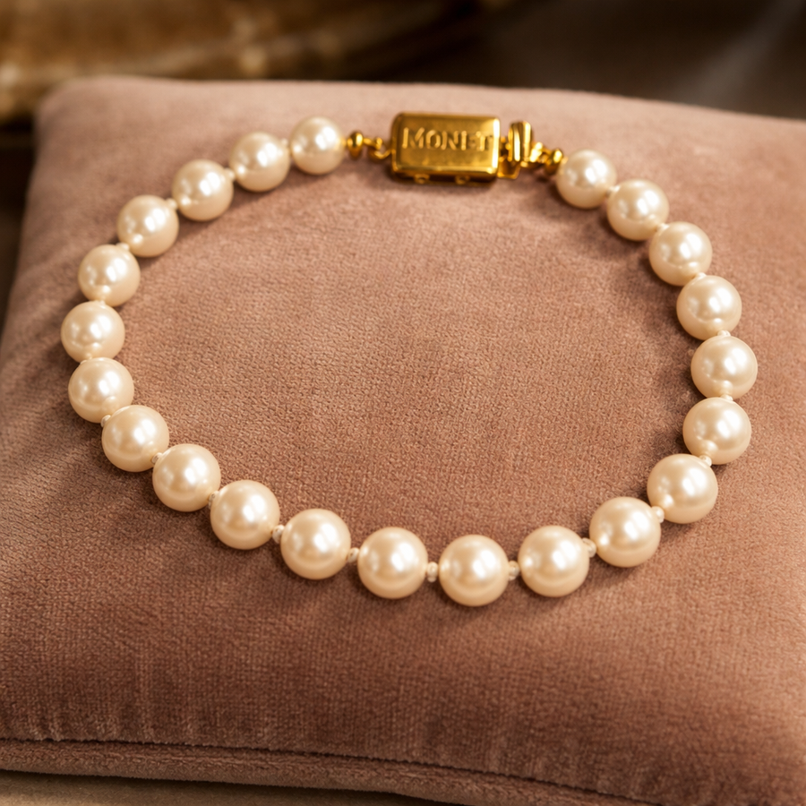 Signed Monet faux pearl bracelet with gold-tone clasp