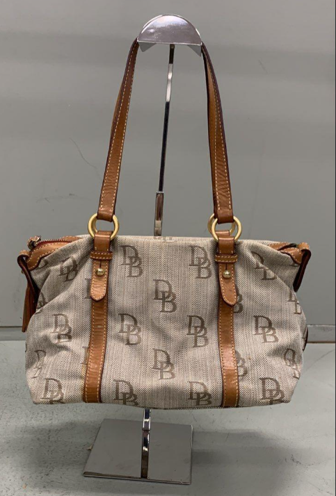 Dooney and Bourke DB monogram canvas barrel satchel with leather trim, rolled handles and tassel, view 6