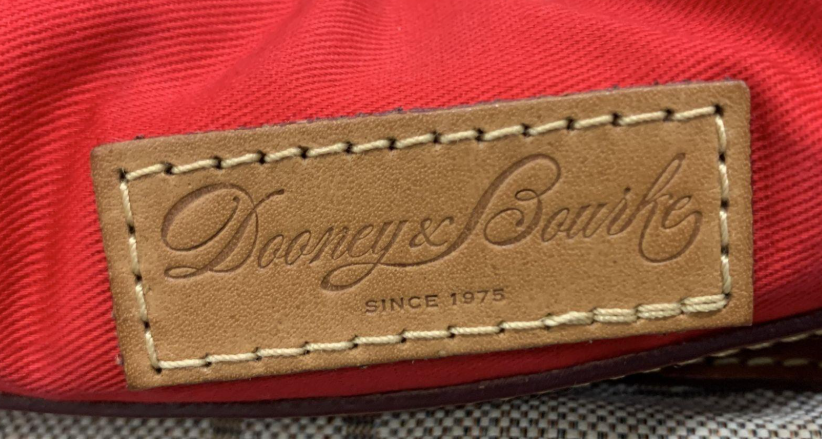 Dooney and Bourke DB monogram canvas barrel satchel with leather trim, rolled handles and tassel, view 3