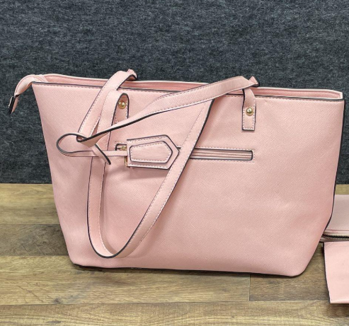 Soft pink structured tote with top handles and small front logo plaque, view 6