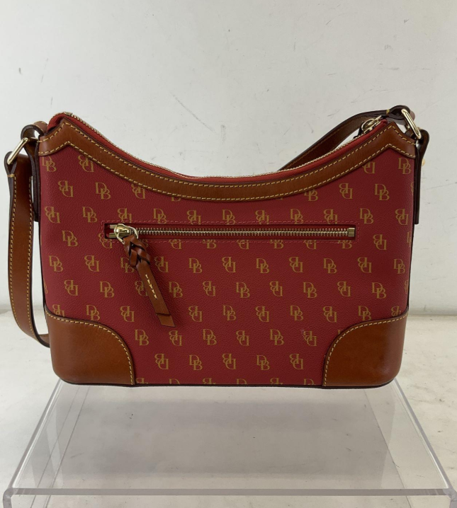 Dooney and Bourke red DB monogram coated canvas shoulder bag with brown leather trim and tassel, view 6