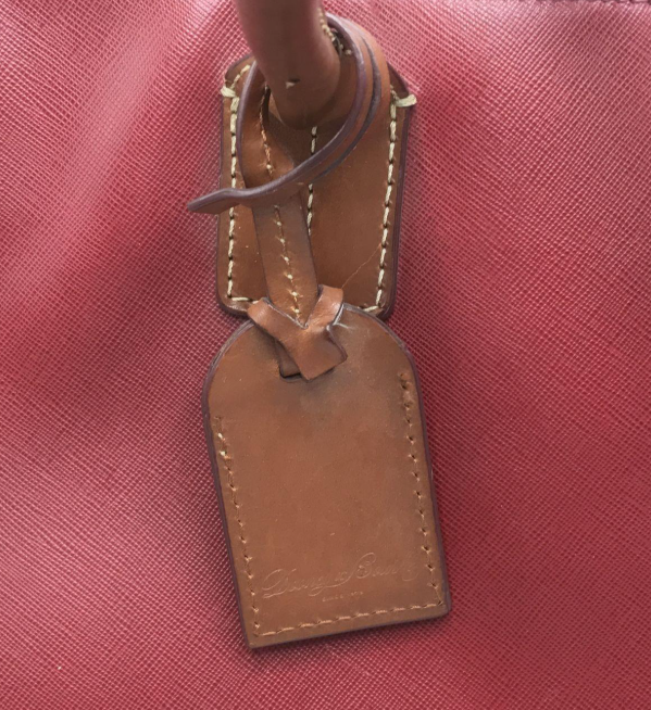 Dooney and Bourke large red pebbled leather shopper tote with tan rolled handles, view 4