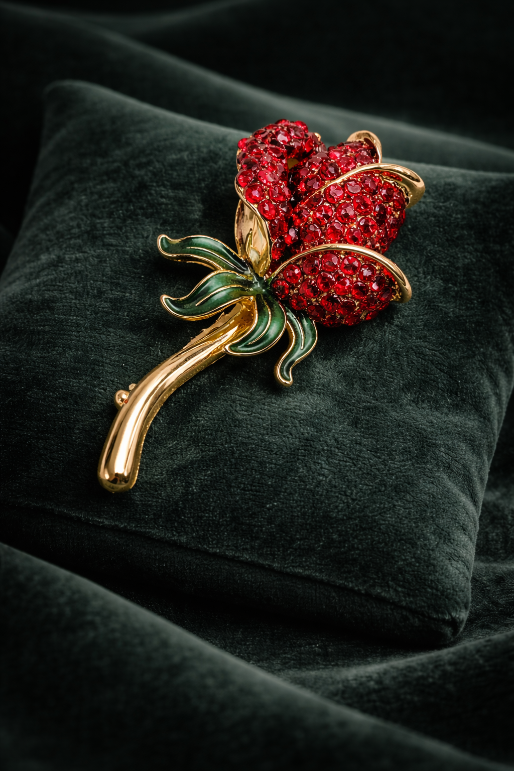 (SOLD) Vintage Monet Gold-Tone Red Rhinestone Rose Brooch with Green Enamel Leaves