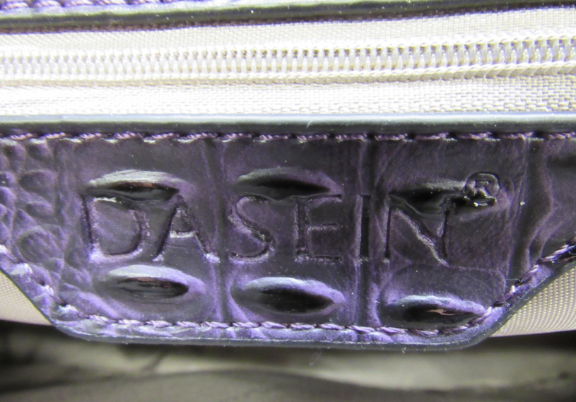 Deep purple ostrich and croc-embossed structured satchel with rolled handles and gold-tone hardware, view 2
