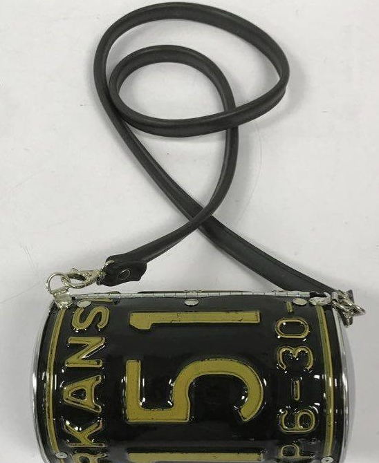 Arkansas license plate novelty barrel crossbody bag in black and yellow with bottle cap clasp, view 5