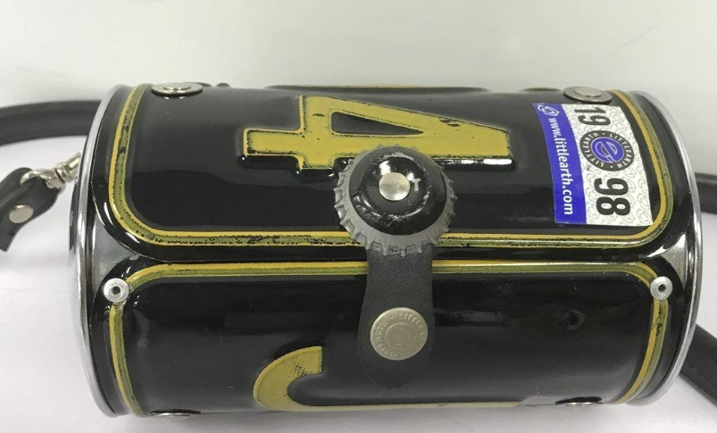 Arkansas license plate novelty barrel crossbody bag in black and yellow with bottle cap clasp, view 4