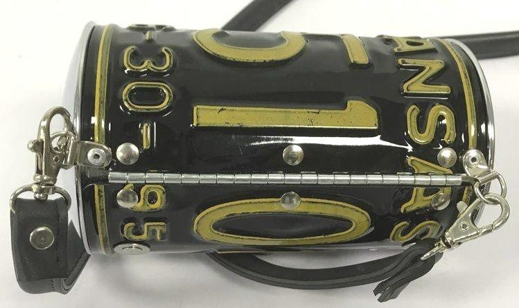 Arkansas license plate novelty barrel crossbody bag in black and yellow with bottle cap clasp, view 3