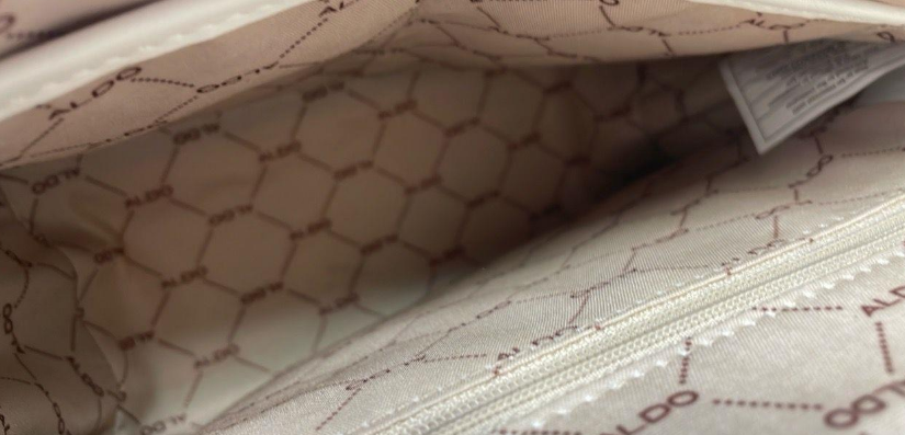 White embossed faux leather crossbody clutch with heart and star motifs and detachable strap, view 4