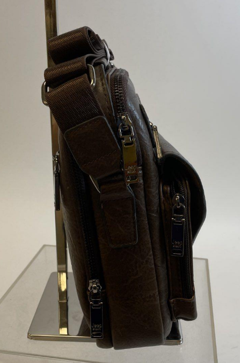 Distressed brown leather vertical crossbody bag with front zip pocket, view 7