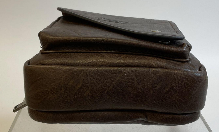 Distressed brown leather vertical crossbody bag with front zip pocket, view 4