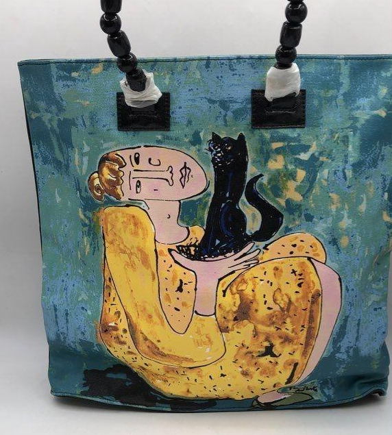 Polly Can art tote with painted woman and black cat on blue background, view 3