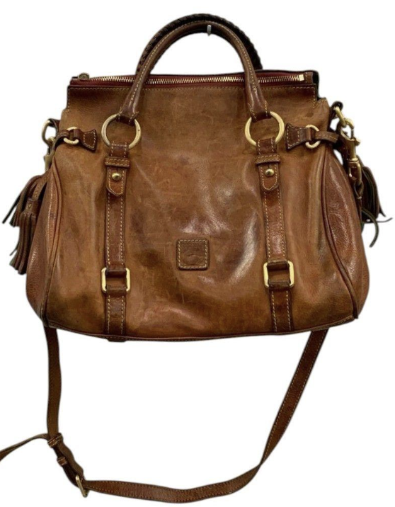 Brown leather satchel with rolled handles, tassel accents and shoulder strap, view 2