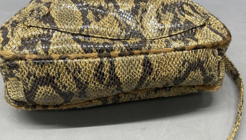 Gold and black snakeskin print flap-front crossbody bag with slim strap, view 5