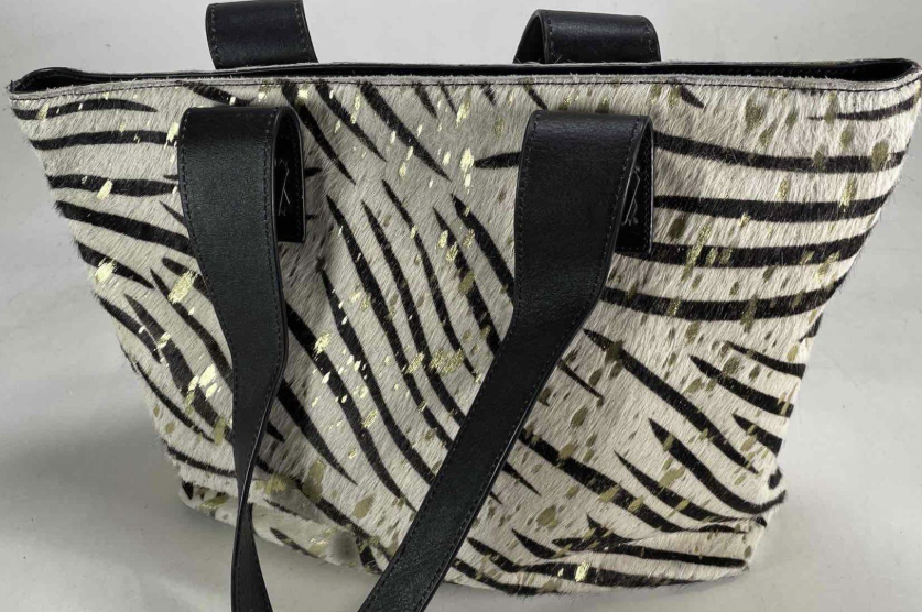 Zebra-striped hair-on-hide tote with black leather handles and trim, view 6