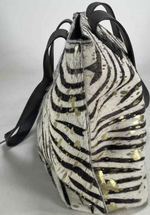 Zebra-striped hair-on-hide tote with black leather handles and trim, view 7