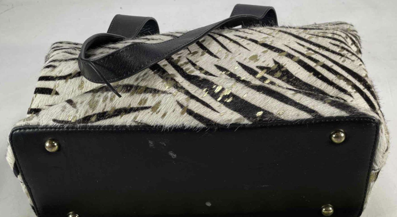 Zebra-striped hair-on-hide tote with black leather handles and trim, view 8