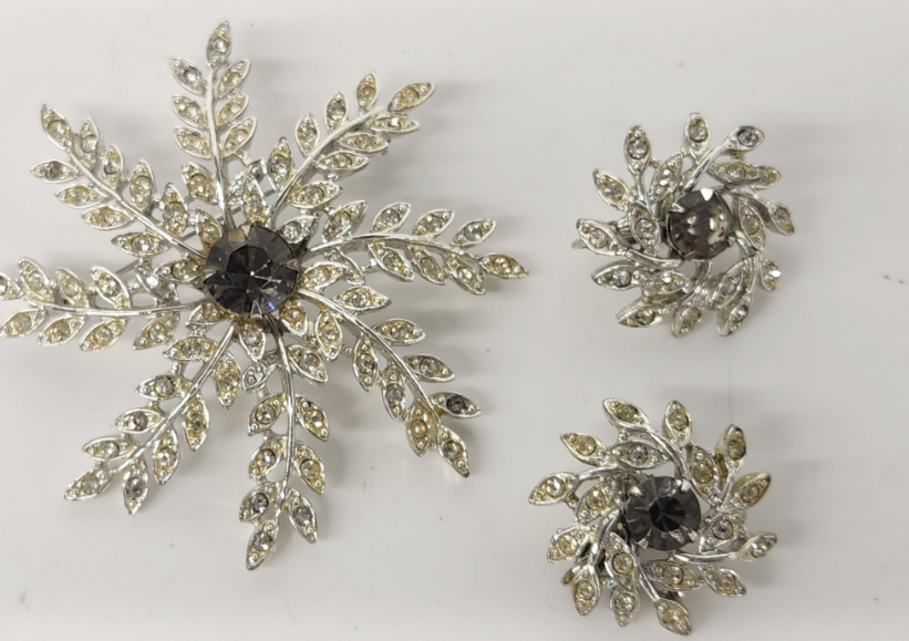 Signed Sarah Coventry silver-tone snowflake brooch and matching clip earrings with clear rhinestones, view 2