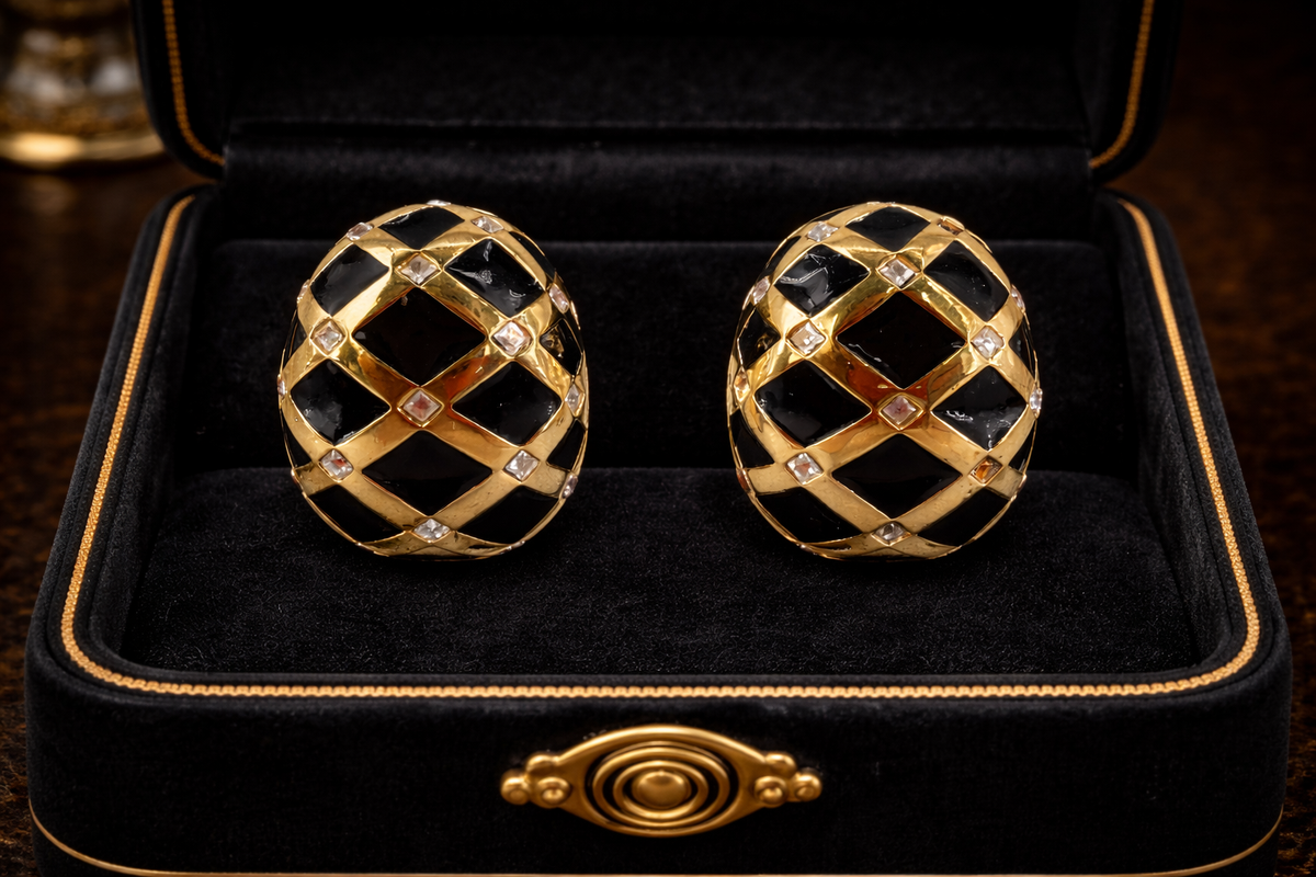 Signed St. John gold-tone dome clip-on earrings with black enamel and rhinestones