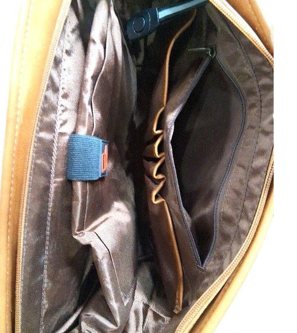 Tan leather flap messenger bag with top handle and shoulder strap, view 4