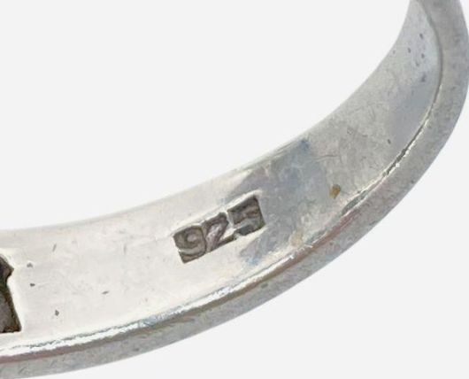 Ring marked 925 with oval blue stone in bezel-style setting and openwork band, view 5