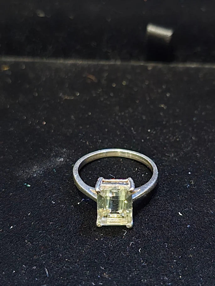 Silver-tone solitaire ring with emerald-cut green center stone, view 4