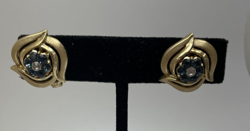 Signed Trifari brushed gold-tone flower clip-on earrings with blue rhinestone centers, view 2