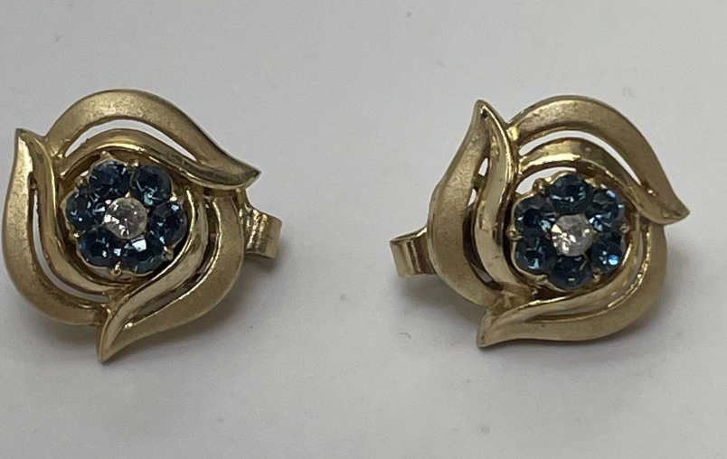 Signed Trifari brushed gold-tone flower clip-on earrings with blue rhinestone centers, view 4