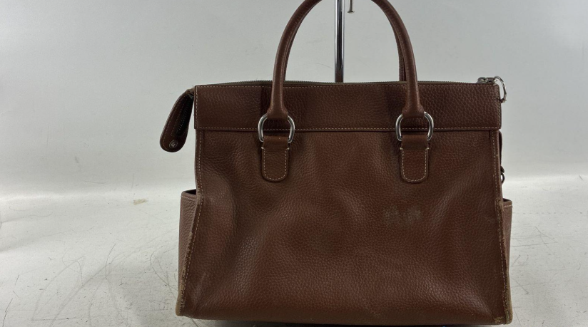 Dooney and Bourke brown pebbled All Weather Leather satchel with two front pockets and rolled handles, view 6