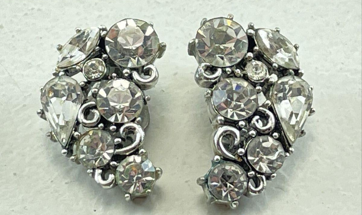 Signed Lisner silver-tone clip-on earrings with clear rhinestones, view 2