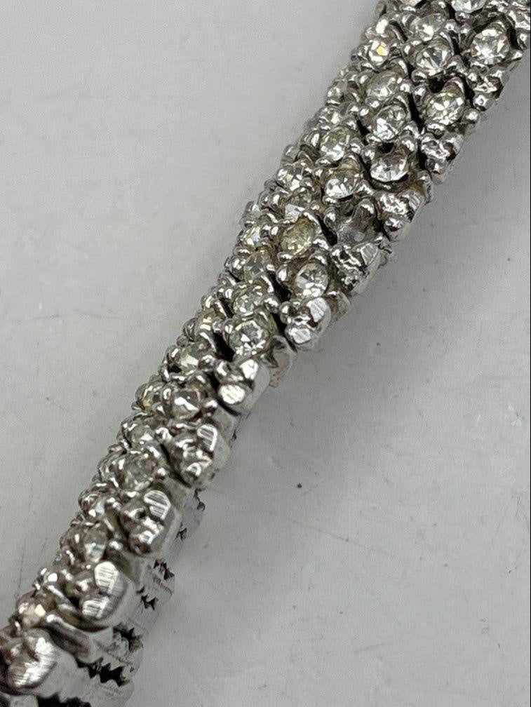 Wide silver-tone panel link bracelet with white rhinestone clusters, view 7