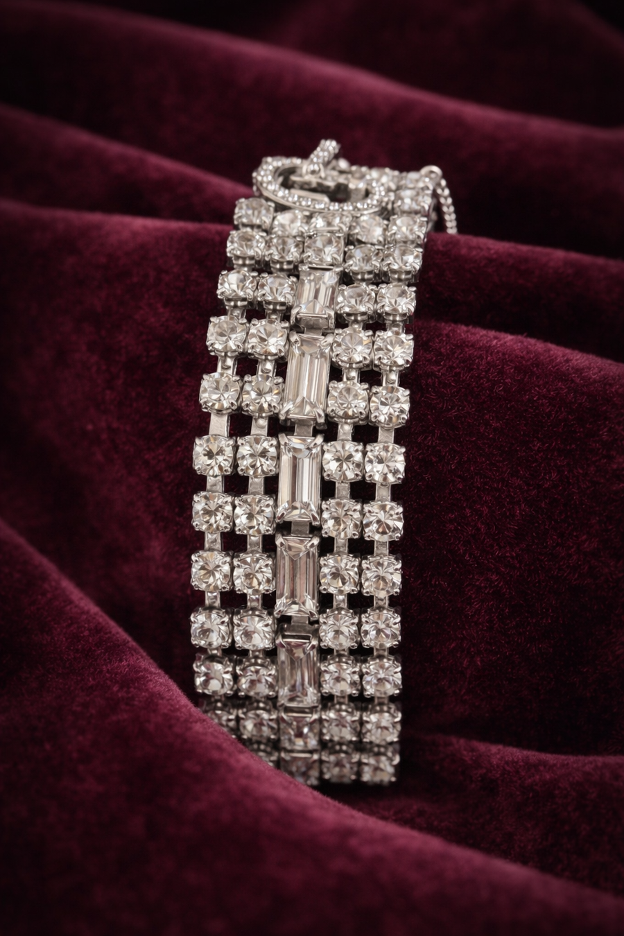 Signed Weiss wide silver-tone rhinestone bracelet with baguette and round stones