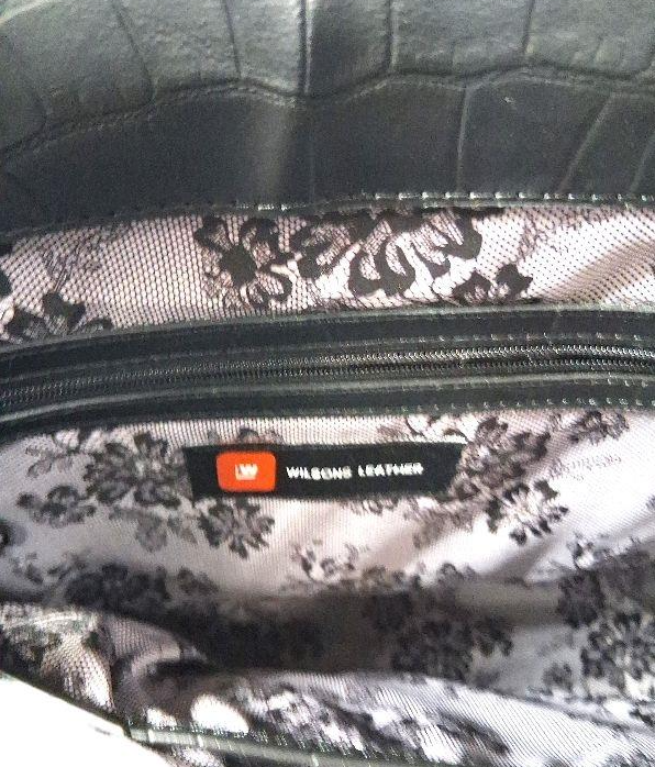 Black croc-embossed leather messenger briefcase with push clasp and purple lace lining, view 5