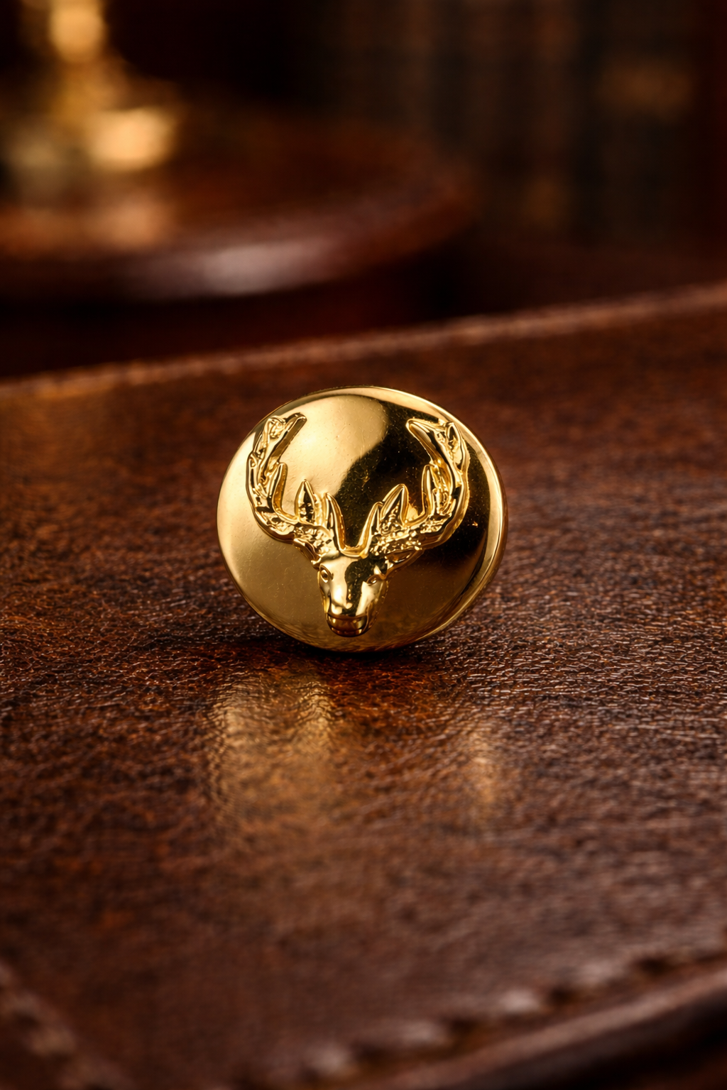 Gold-tone stag deer head lapel pin with crystal accents