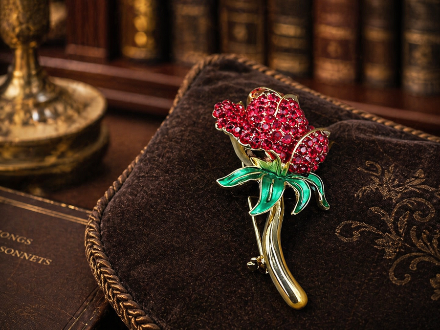 Monet gold-tone rose brooch with red crystal bloom and green enamel leaves, with Monet box